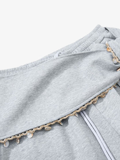 Stylish Wide-Leg Pants with Unique Waist Detailing for Women