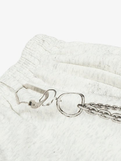 Unique Embellished Wide-Leg Trousers with Chain Detail for Fashionable Comfort