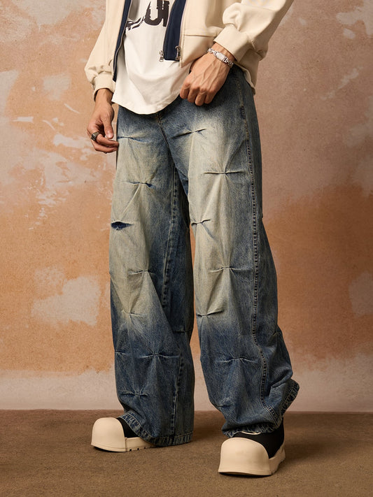 Distressed Washed Pleated Jeans