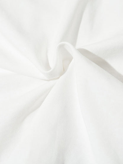 Close-up of white fabric with folds