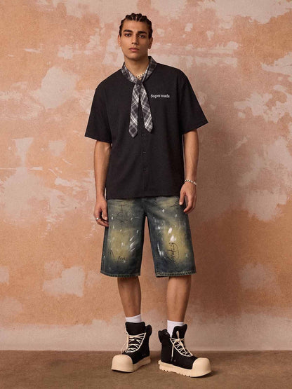 ライトウォッシュ加工のダメージデニムショートパンツ
