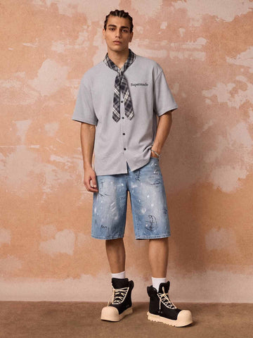 ライトウォッシュ加工のダメージデニムショートパンツ