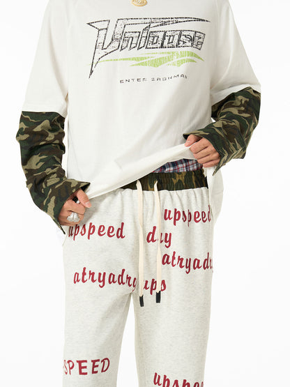 Camouflage Sleeve Sweatpants with Bold Typography Print 