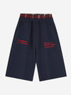 Sportliche Shorts mit besticktem Buchstaben-Karo-Patchwork