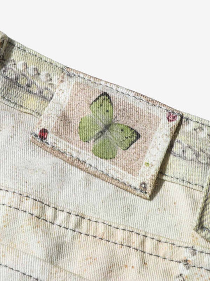 Embellished Wide-Leg Jeans with Unique Artistic Design for Fashion Lovers 