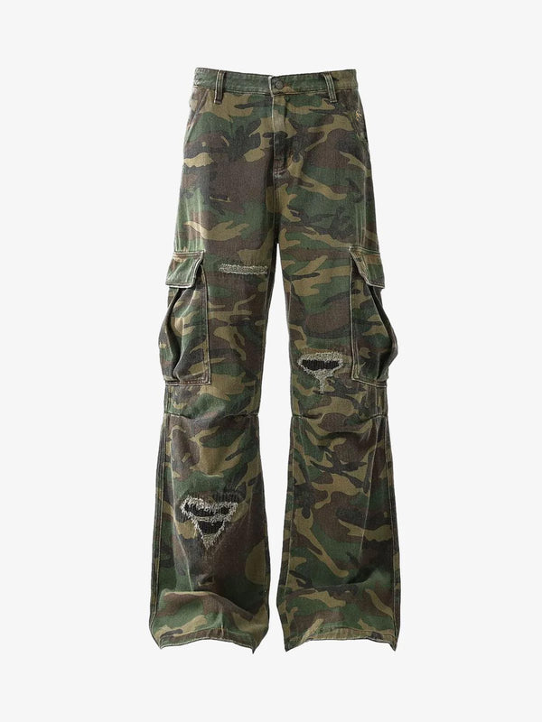Ripped camouflage baggy cargo pants with a flared lower leg