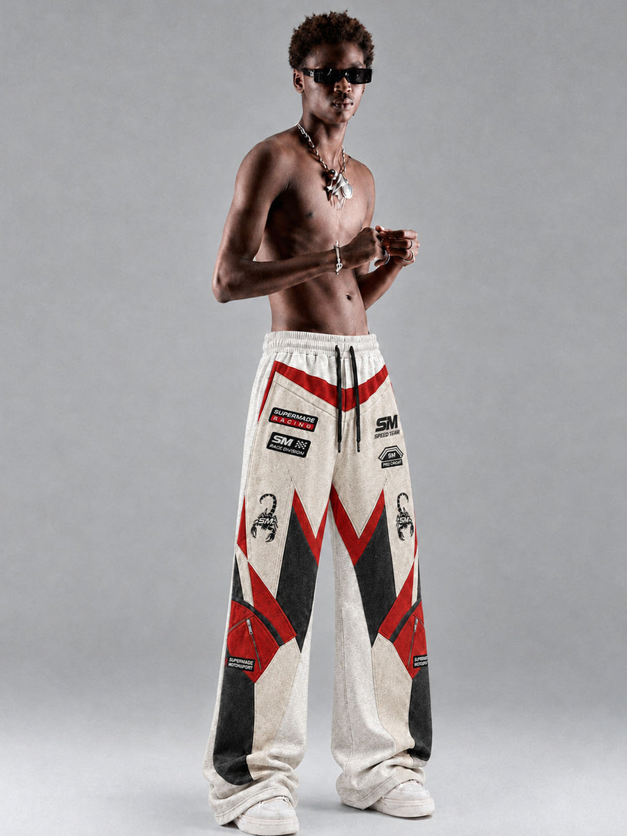 Pantalones deportivos de pierna ancha, lavados y desgastados, con gráfico 3D de motociclista