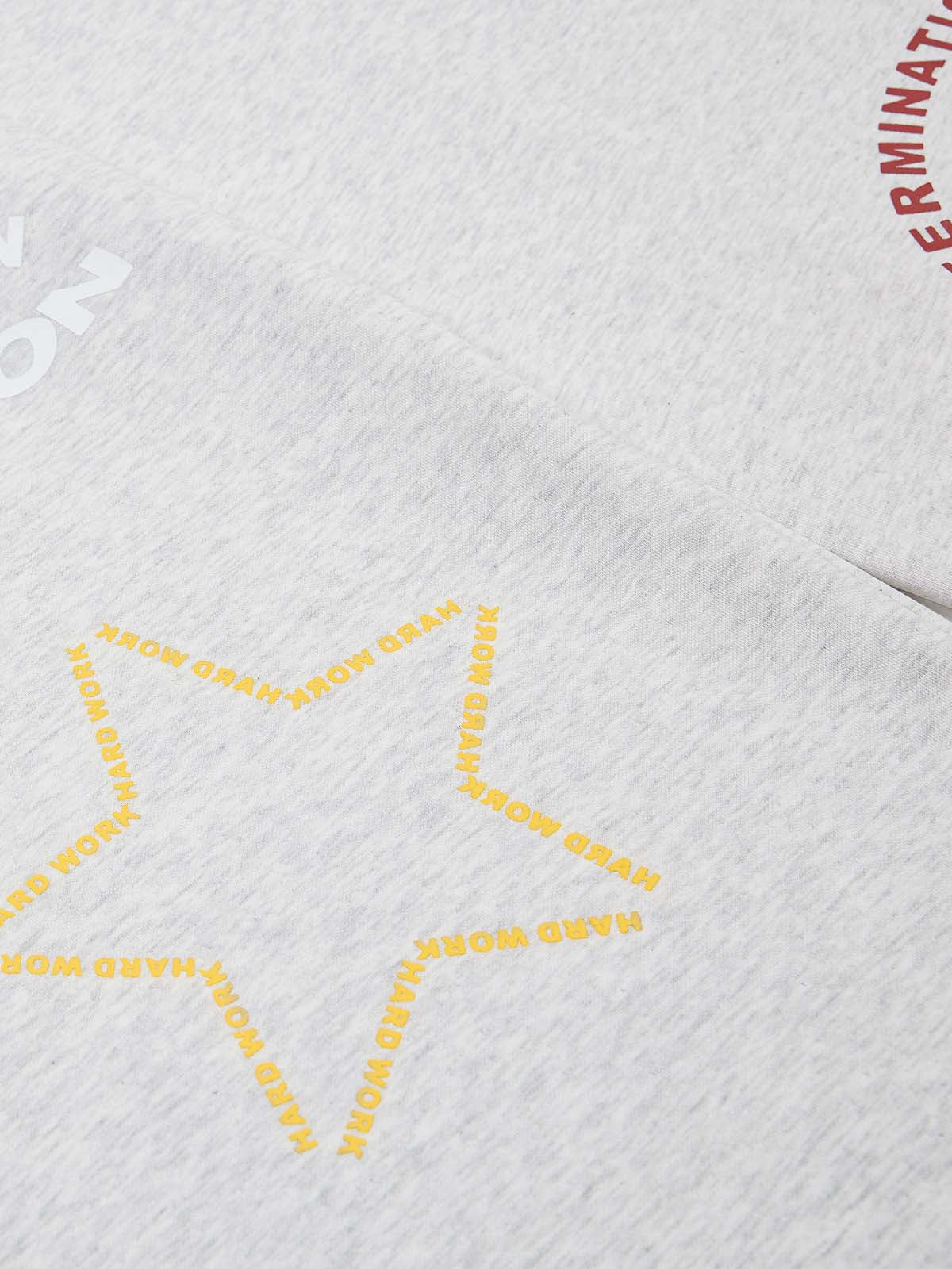 Pantalon de survêtement à jambes larges avec typographie multicolore