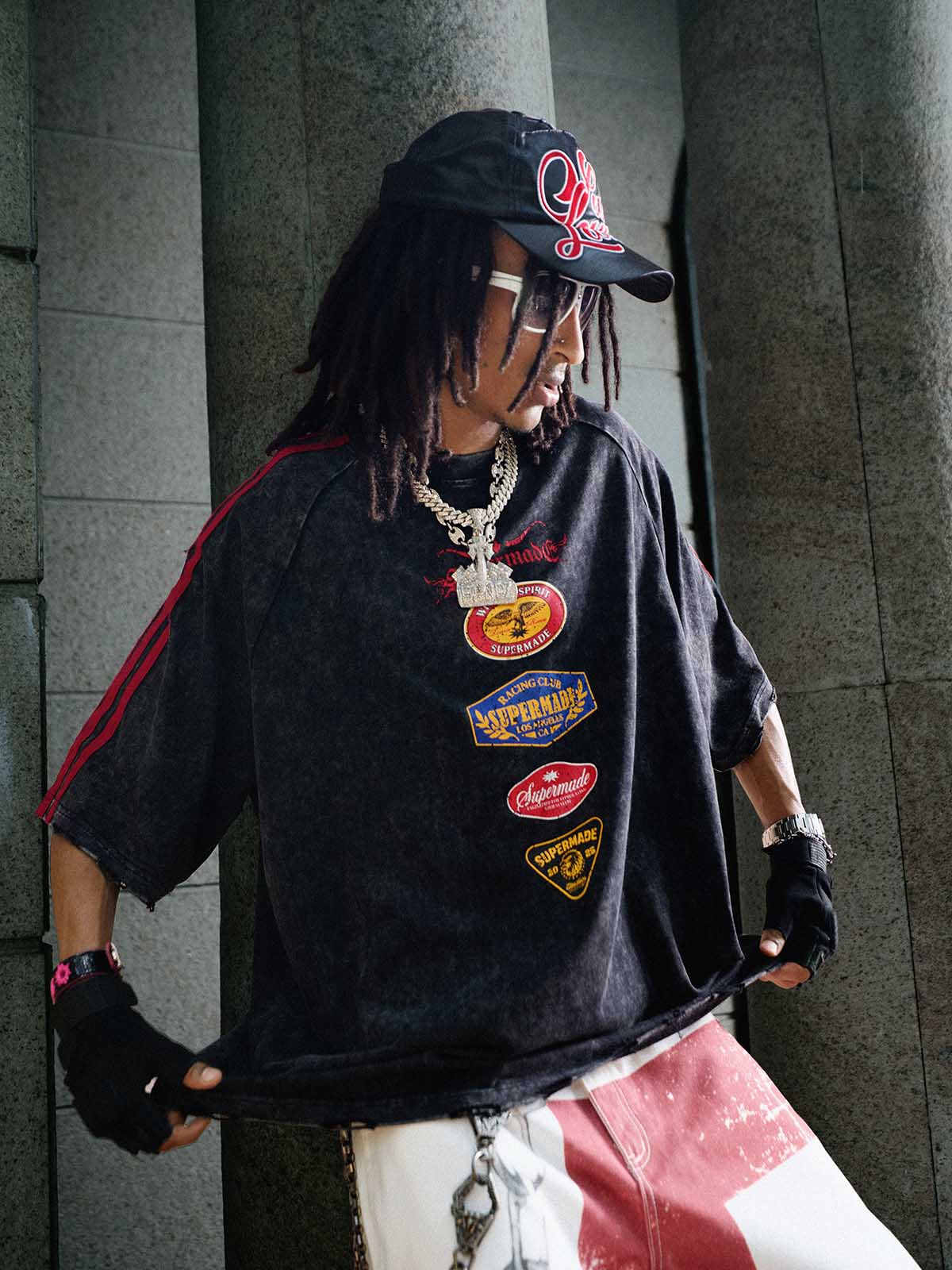 ウォッシュ加工のモトグラフィック入りダメージ加工ラグランTシャツ