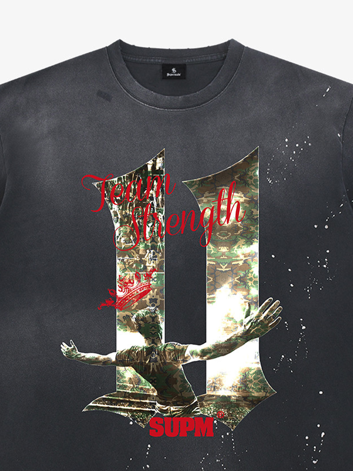 Unisex distressed loose-fitting cotton short-sleeved T-shirts featuring a print of the "11" team strength from the FIFA World Cup and a splatter-wash finish. 
