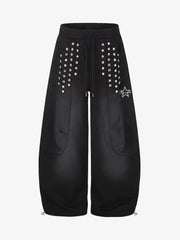Pantaloni della tuta a gamba larga con borchie