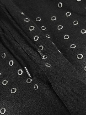 Gewaschene, bestickte Hose mit Ösen und Nieten