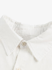 Stylish White Button-Up Shirt with Unique Patch Design for Casual and Trendy Looks 