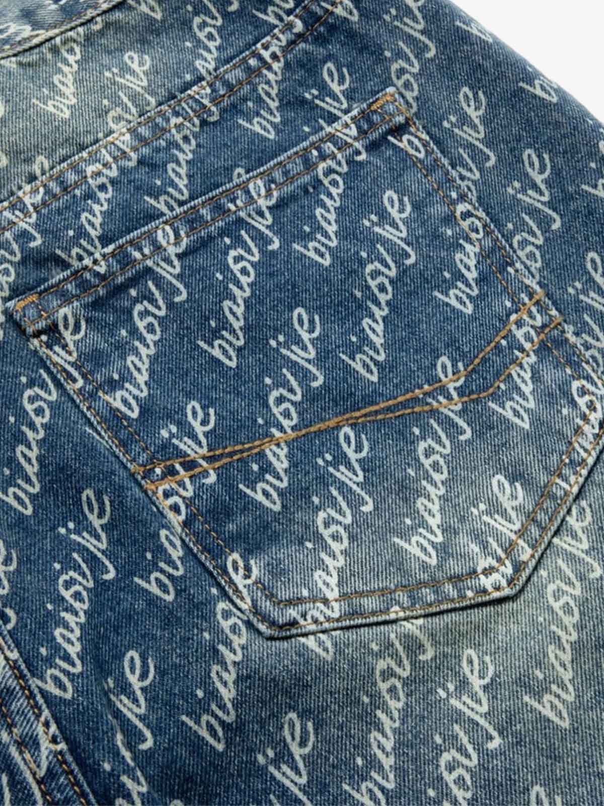 All-Over Letter Graphic Distressed Jeans