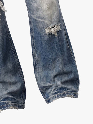 Jean bootcut à clous et drapeau
