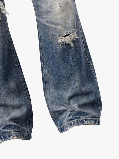 Jean bootcut à clous et drapeau