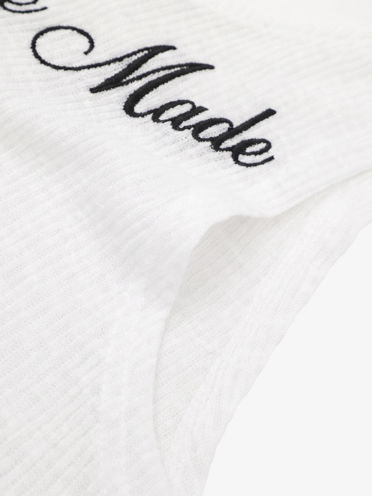 Gilet ricamato con motivi floreali e lettere