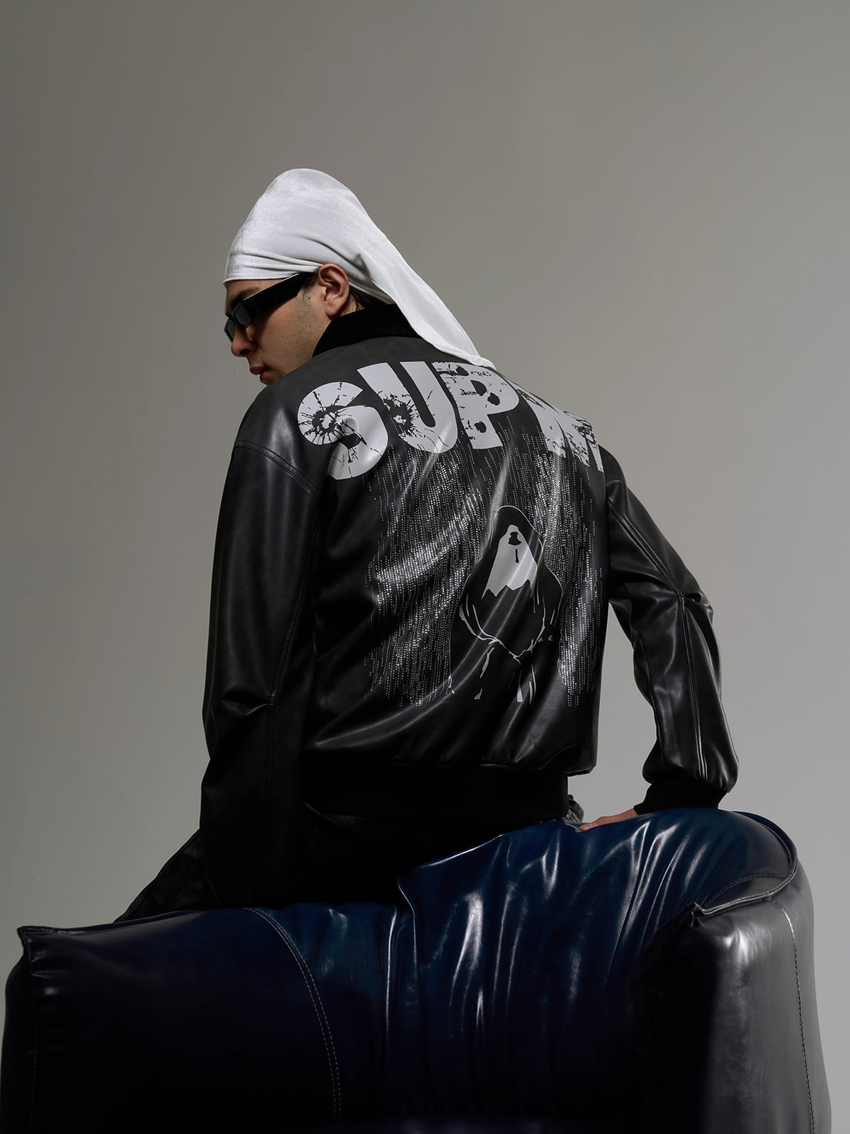 SUPM Leather Jacket with a Fur Collar and Bullet Hole Monogram Print and Rhinestone Pattern 