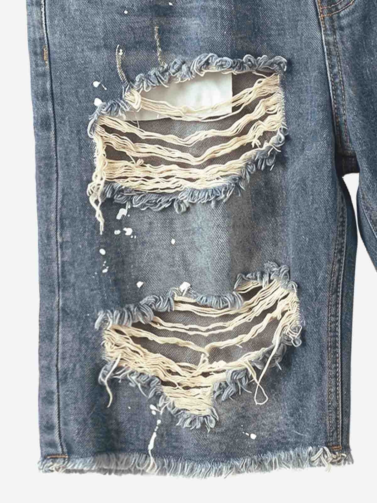 Vaqueros holgados con salpicaduras de pintura