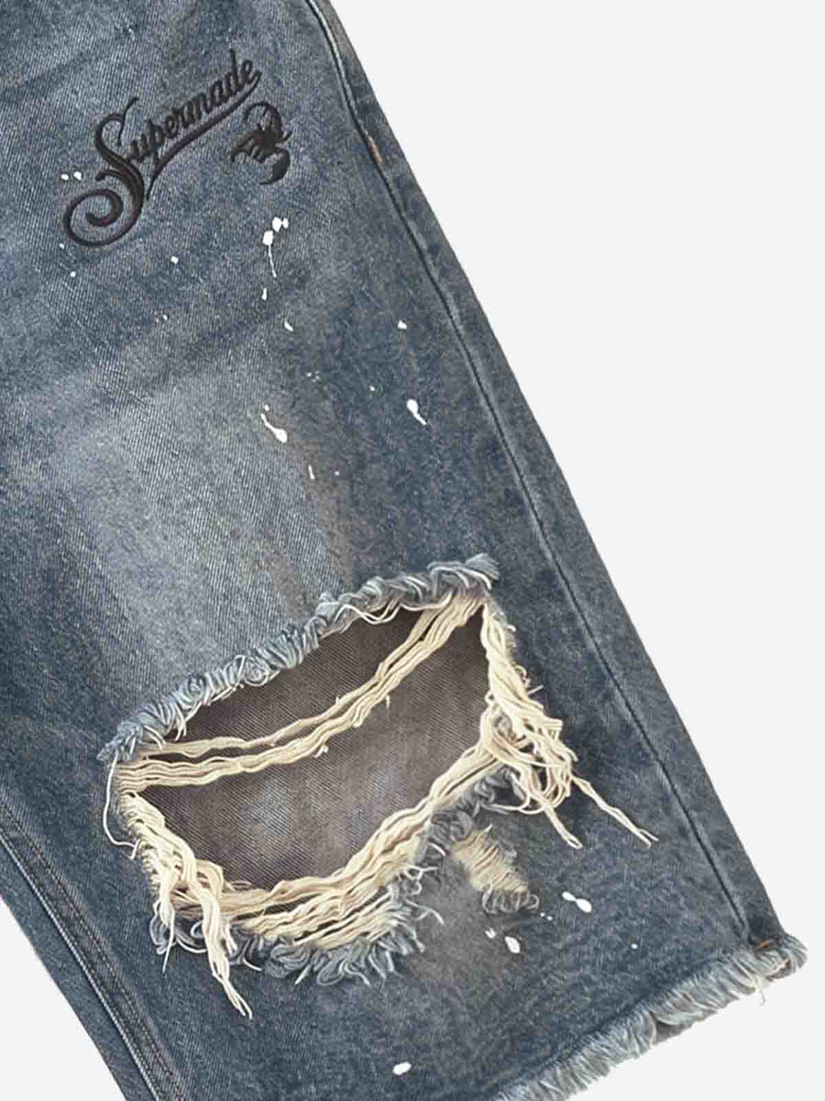 Vaqueros holgados con salpicaduras de pintura
