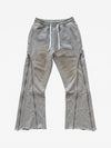 Pantalon déformable à fermeture éclair latérale