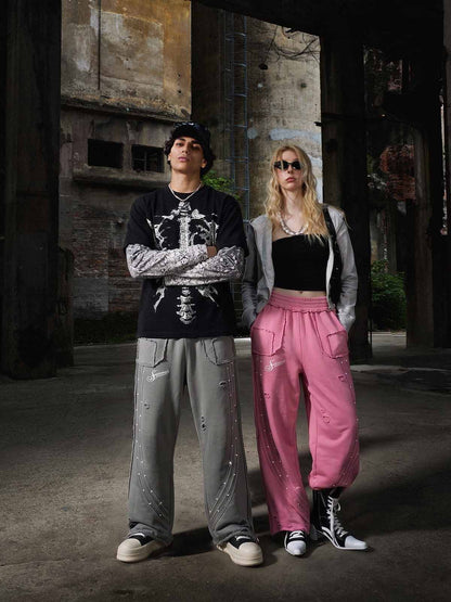 Pantalon asymétrique brodé du logo