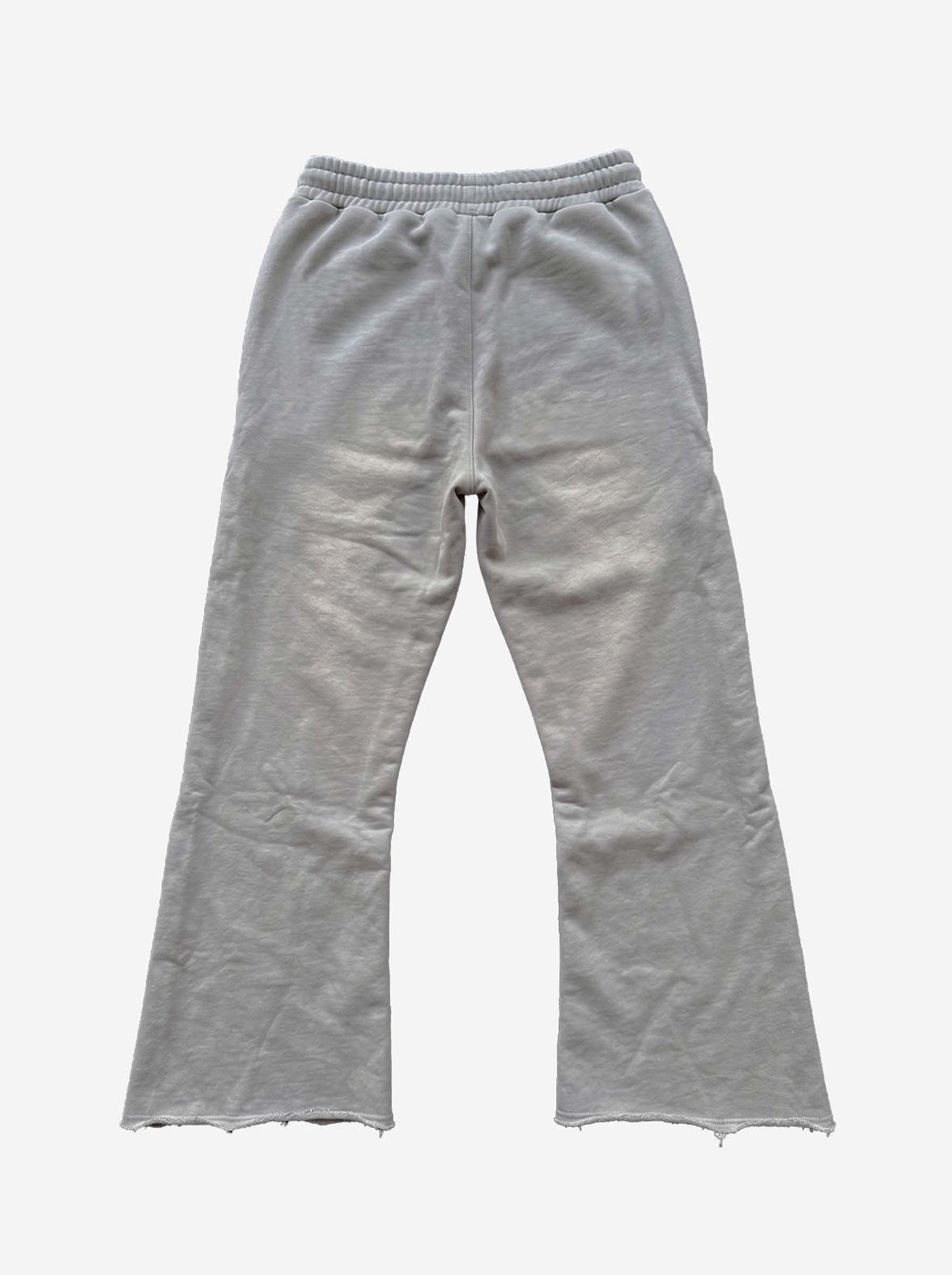 Pantalones deformables con cremallera lateral