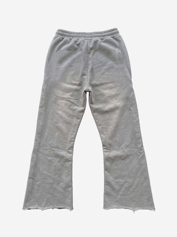 Pantalones deformables con cremallera lateral