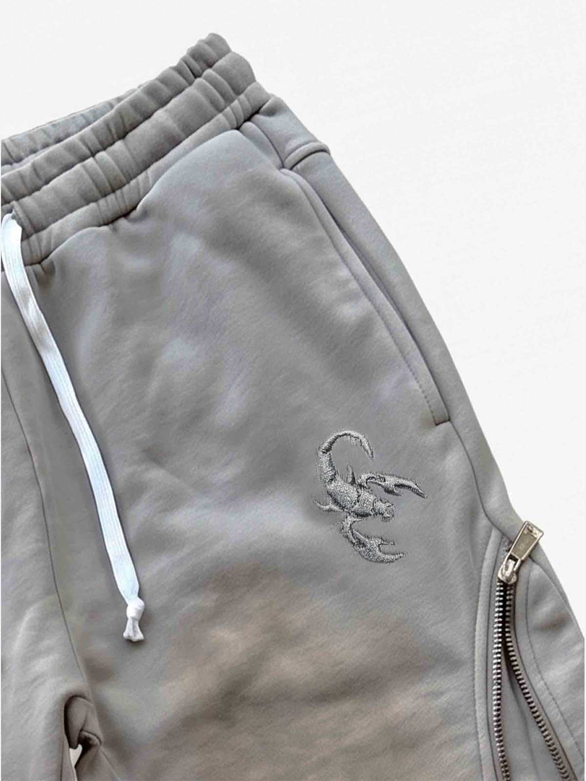 Pantalon déformable à fermeture éclair latérale