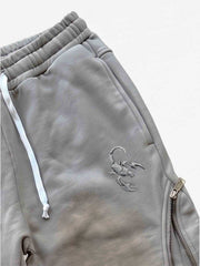 Pantalon déformable à fermeture éclair latérale
