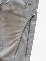 Pantalon déformable à fermeture éclair latérale