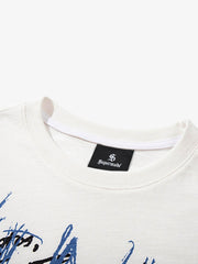 T-shirt con grafica astratta dipinta a mano