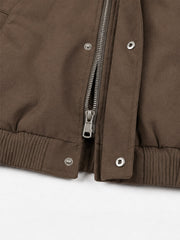 Chaqueta bomber extragrande desgastada con cuello de piel sintética bordado