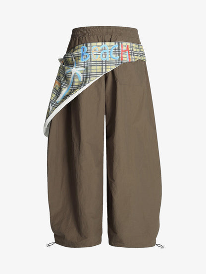 Stylish Wide-Leg Pants with Plaid Overlay for Modern Fashionistas 