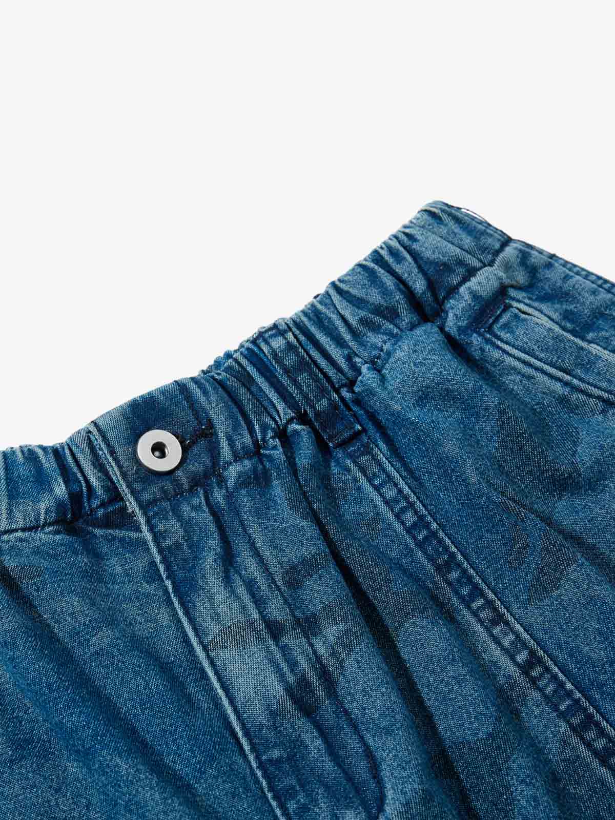 Deconstructed Washed Jeans with Graphic Print
