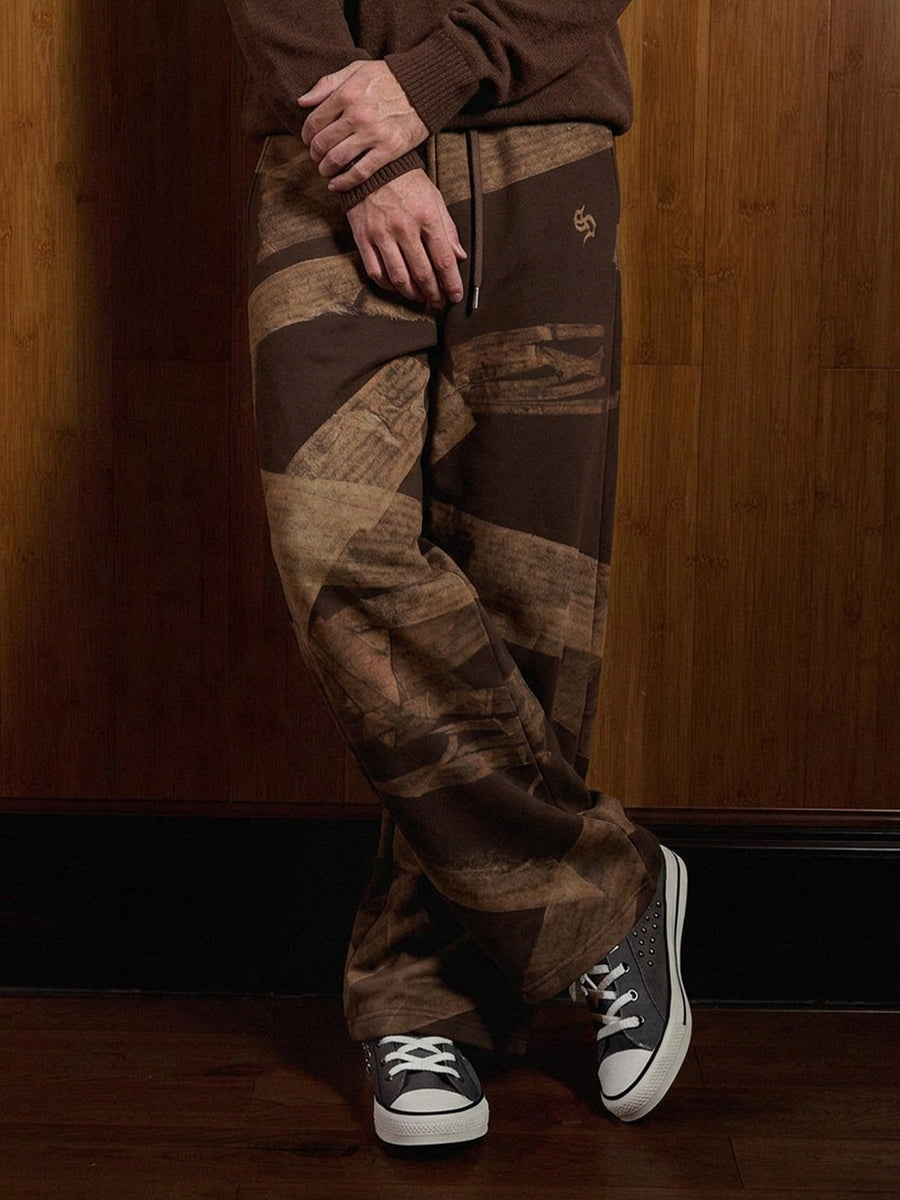 Weite Jogginghose mit Vintage-Sticker-Print im Used-Look