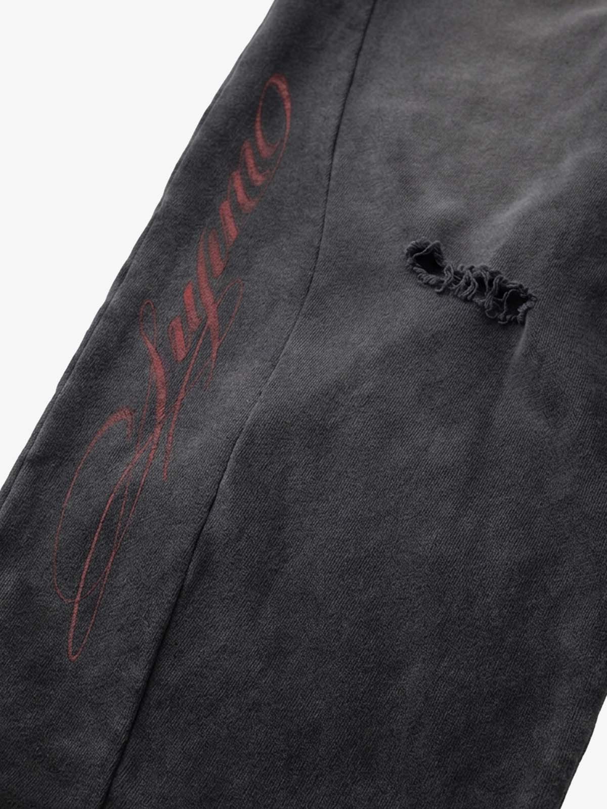 Pantalon ample délavé effet vieilli à fausses languettes