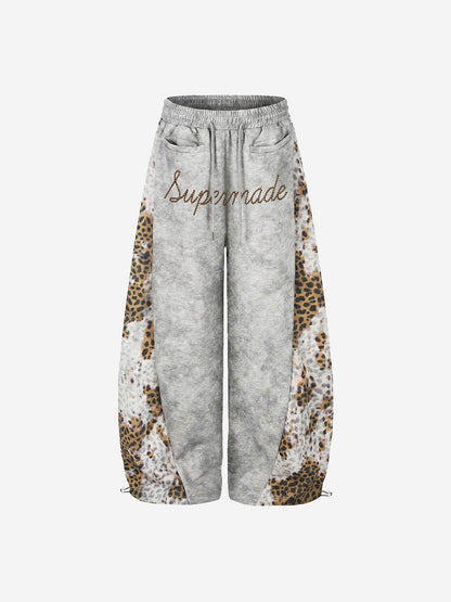 Pantalon de survêtement patchwork léopard avec logo strass