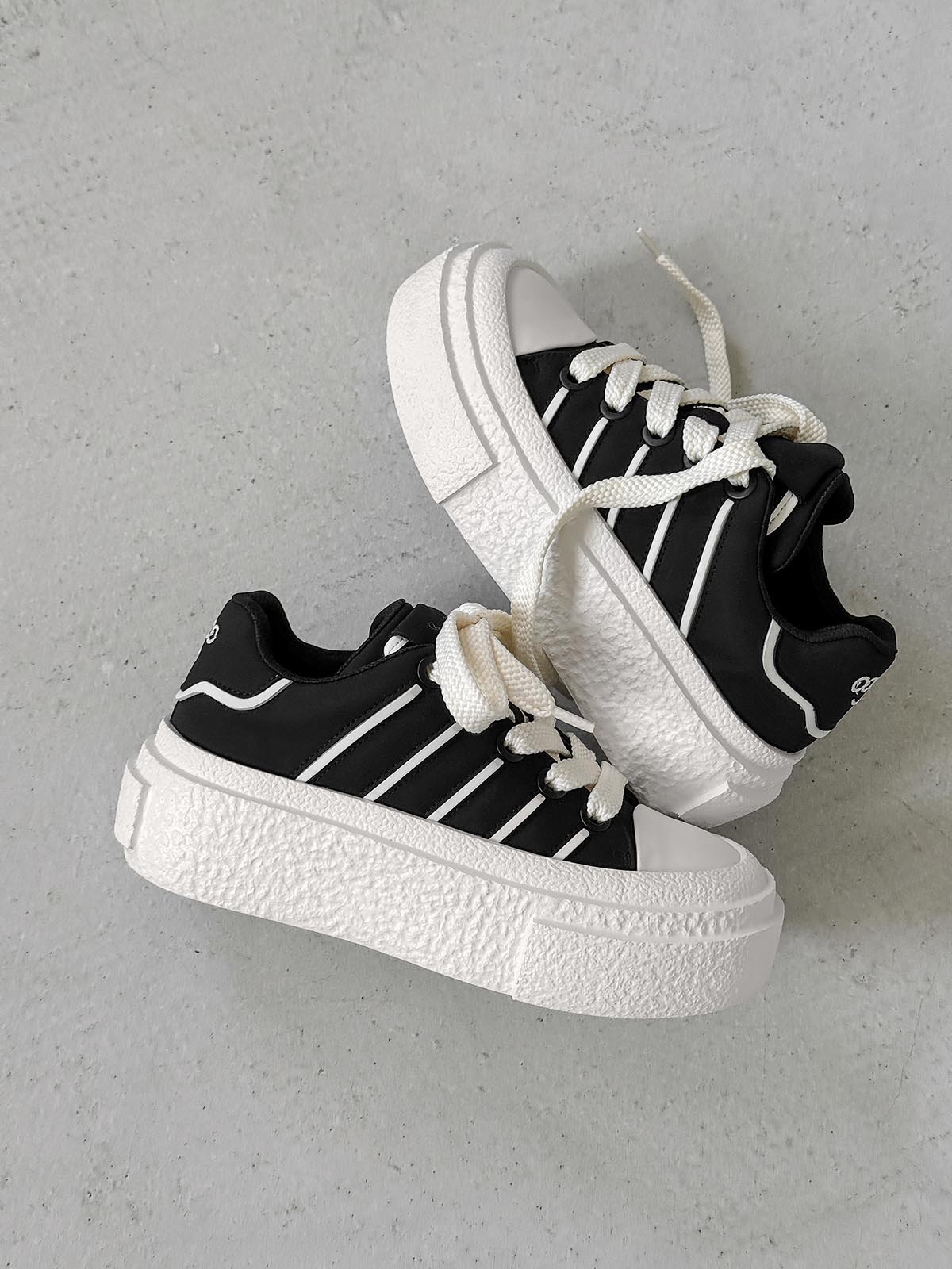 Hidden Height-Boosting Sneakers with Stylish Platform Design 