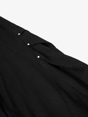 Pantaloni cargo larghi con bottoni in metallo