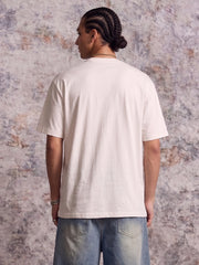 T-shirt con grafica astratta dipinta a mano