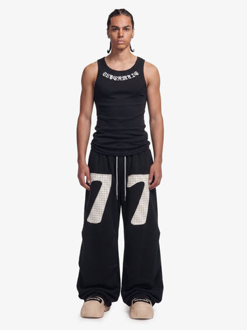 Pantalones deportivos fruncidos de doble talle