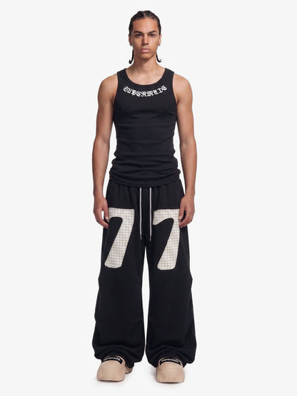 Pantalones deportivos fruncidos de doble talle