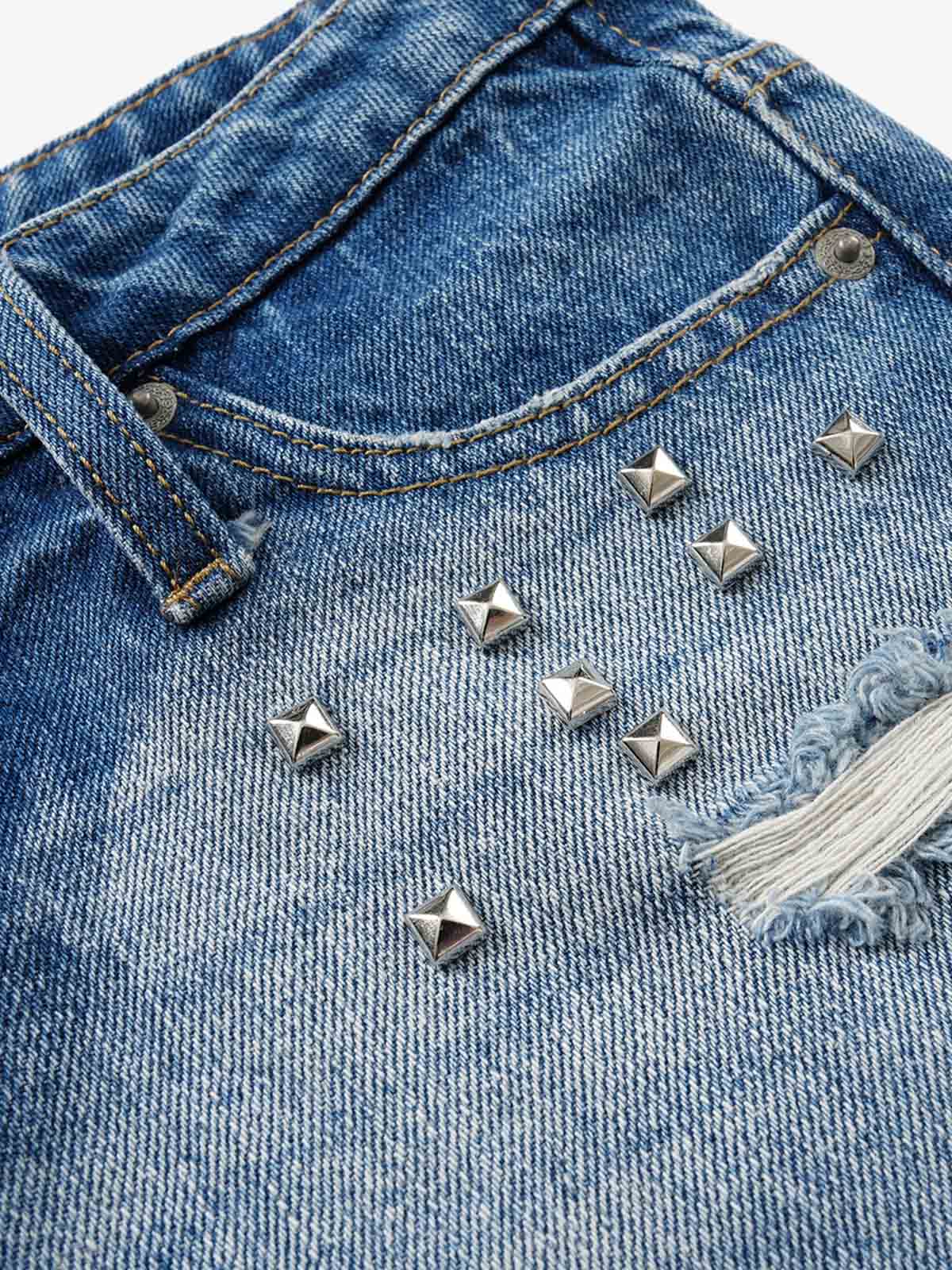Mini shorts a vita bassa con borchie metalliche effetto invecchiato di Thesupermade