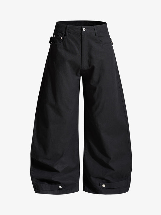 Pantaloni con pannello posteriore staccabile e rivettati