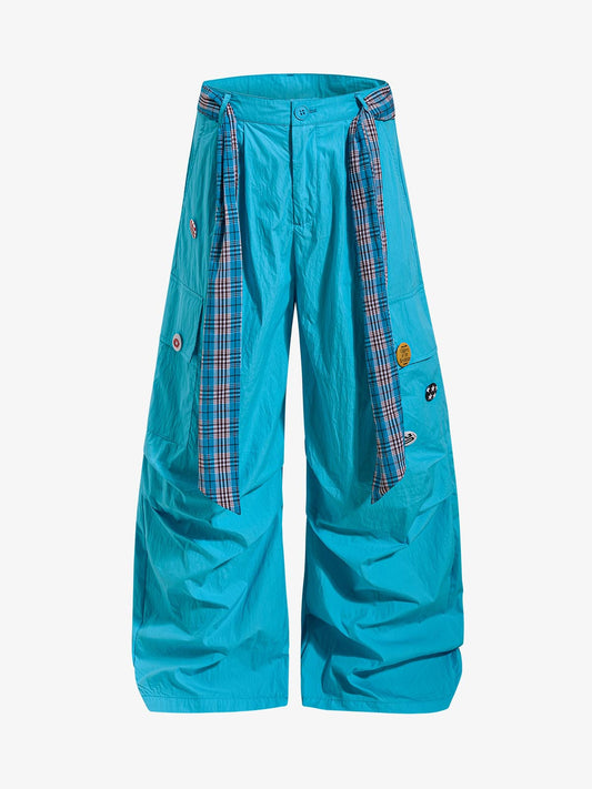 Pantalon cargo à bretelles à carreaux