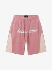 Pantaloncini in camoscio color block con lettere ricamate