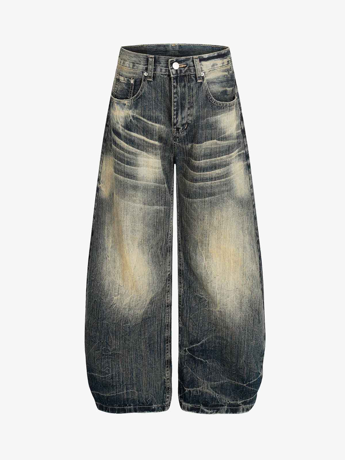 Dirty Wash Distressed Curved Blade Denim Jeans