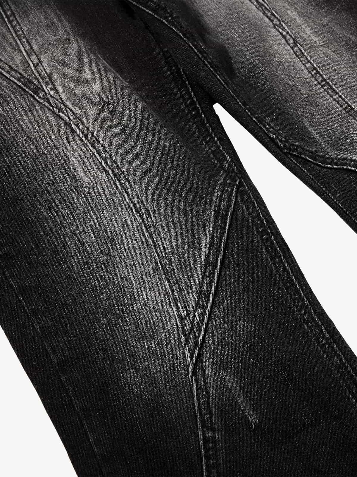 Black Denim Wide-Leg Jeans with Asymmetric Stitching and Button Details 