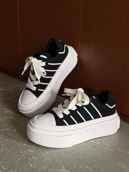 Hidden Height-Boosting Sneakers with Stylish Platform Design 
